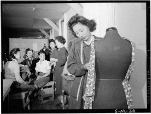 Dressmaking class, Manzanar Relocation Center, California / photograph by Ansel Adams